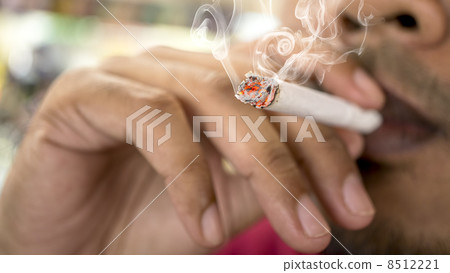 Close-up of Smoking cigarette 8512221