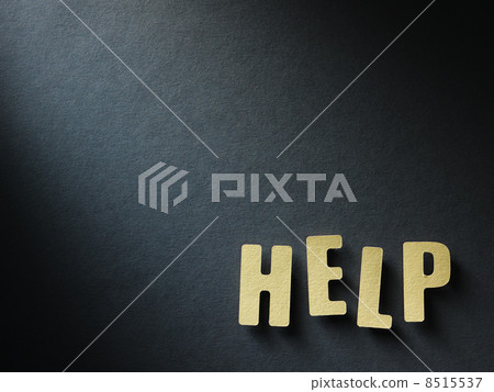 The word Help on paper background 8515537