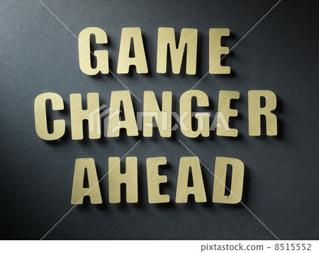 The word Game Changer Ahead on paper background 8515552