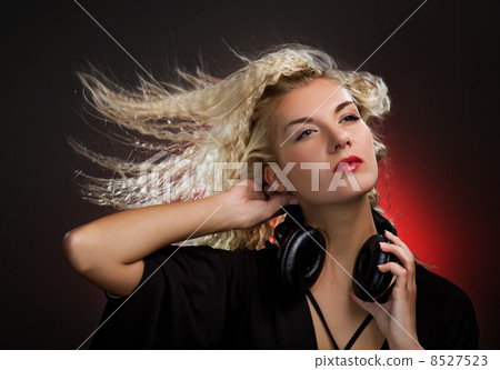 Beautiful young woman with headphones Beautiful young woman with headphones 8527523