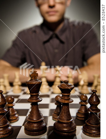 Chess master thinking before making a move (shallow Dof, focus o 8528437