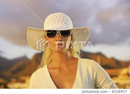 Attractive young woman near the yachts Attractive young woman near the yachts 8528457