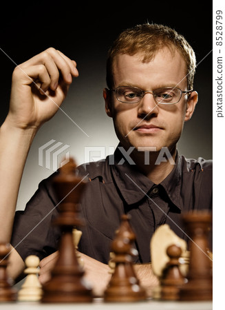 Chess master making smart move Chess master making smart move 8528799