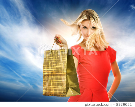 Beautiful young woman with a bag 8529031