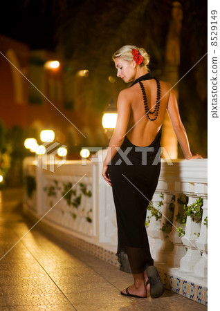 Beautiful young woman relaxing outdoors 8529149