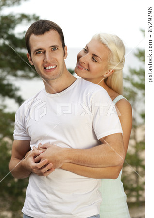 Beautiful young couple outdoors 8529296