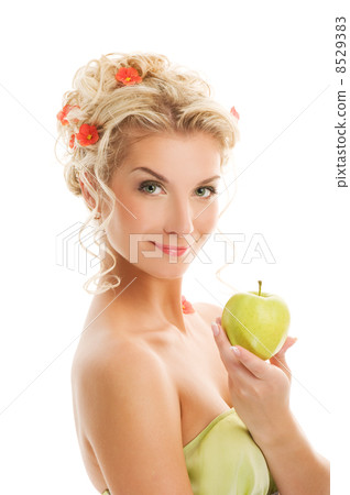 Beautiful young woman with ripe green apple. Spring concept Beautiful young woman with ripe green apple. Spring concept 8529383