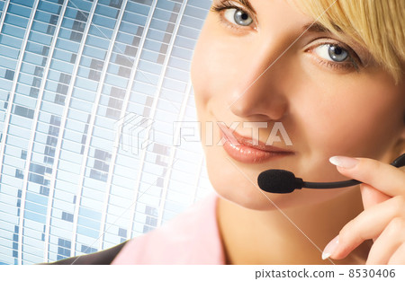 Friendly phone operator on blue abstract background 8530406