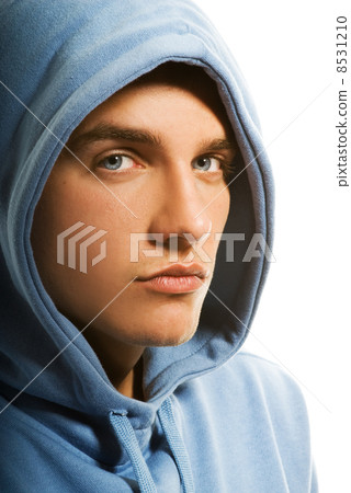 Handsome young man in a hood Handsome young man in a hood 8531210