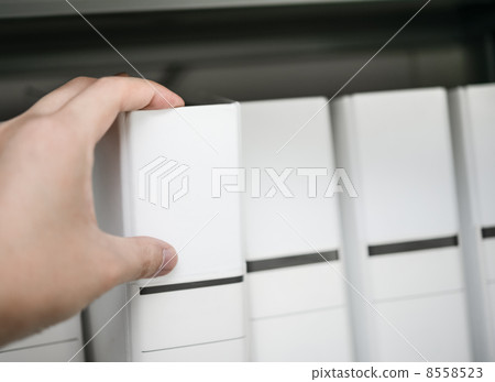 Businessman taking a binder 8558523