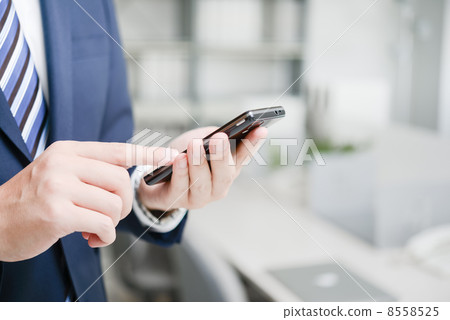 Smartphone and businessman 8558525