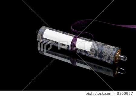 Scrolls on black background 8560957