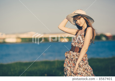 Beautiful young girl with long hair Beautiful young girl with long hair 8567401