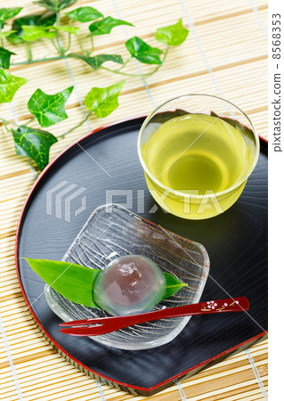 Kuzuke and green tea on bamboo grass Kuzuke and green tea on bamboo grass 8568353