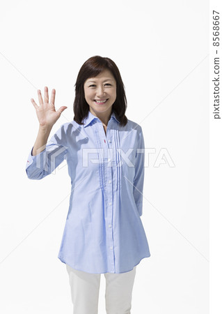 Mature women waving hands Mature women waving hands 8568667