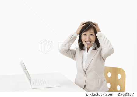 Business woman holding a head 8568837