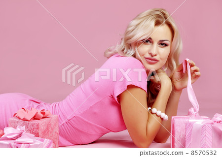 Blond girl with gifts 8570532
