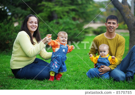 Happy parents with twins Happy parents with twins 8570785
