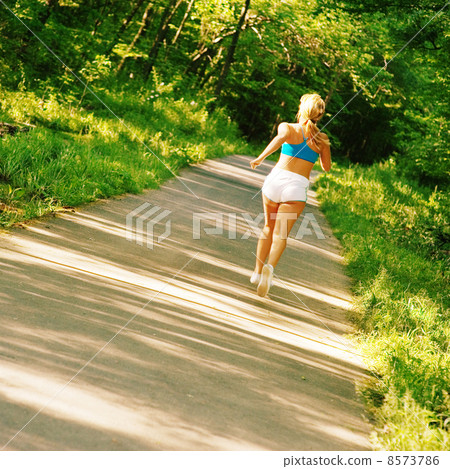 Young Woman Working Out Young Woman Working Out 8573786