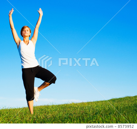 Young Woman Doing Yoga Young Woman Doing Yoga 8573952
