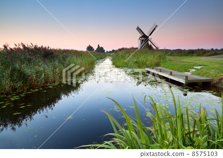 sunrise over river and Dutch windmill sunrise over river and Dutch windmill 8575103