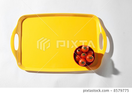 bright yellow tray with tomatoes 8579775