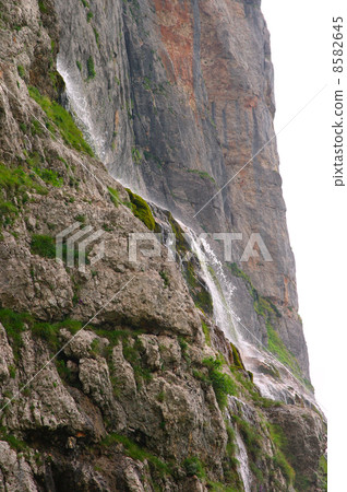 Waterfall in rocky Mountains Caucasus High view sideways Waterfall in rocky Mountains Caucasus High view sideways 8582645