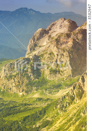 Rocky Mountains in Caucasus and green valley Landscape Summer day Rocky Mountains in Caucasus and green valley Landscape Summer day 8582647