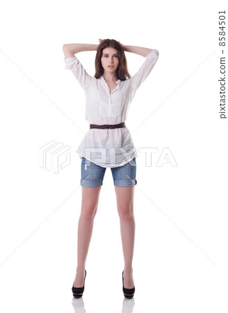Image of tall brunette posing in casual clothes 8584501