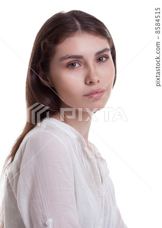 Portrait of young beautiful girl with freckles Portrait of young beautiful girl with freckles 8584515