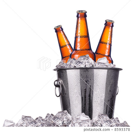 Beer bottles in ice bucket isolated Beer bottles in ice bucket isolated 8593378