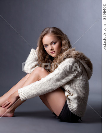 Smiling beautiful girl posing in casual clothes Smiling beautiful girl posing in casual clothes 8596408