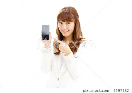 A woman showing a smartphone A woman showing a smartphone 8597582