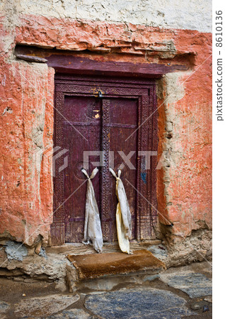 Old door at Buddhist monastery temple 8610136