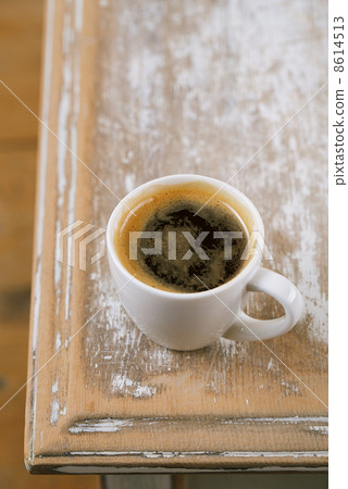 espresso coffee and almonds on old rustic table espresso coffee and almonds on old rustic table 8614513