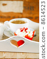red festive muffin and coffe, on wooden tray 8614523