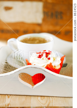 red festive muffin and coffe, on wooden tray red festive muffin and coffe, on wooden tray 8614523