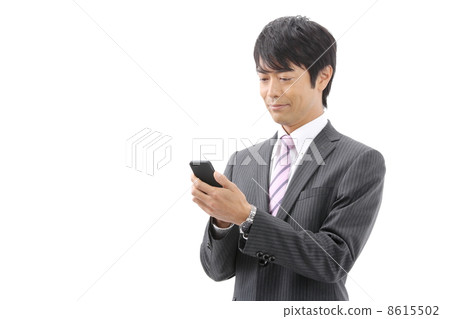 Businessmen using smartphones 8615502