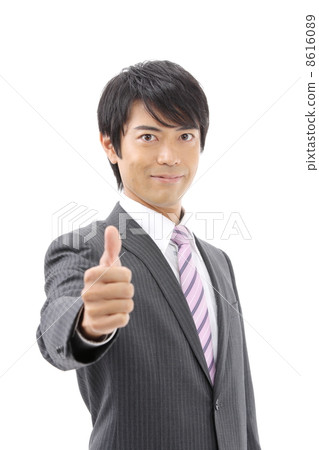 一個商人豎起大拇指 8616089
