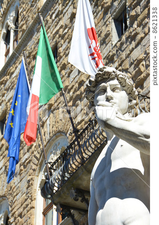 Statue of David and the Italian flag 8621338