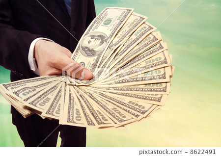 Businessman and dollar bill 8622491