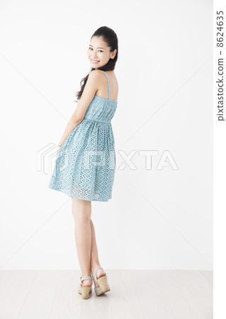 A green one piece woman A green one piece woman 8624635