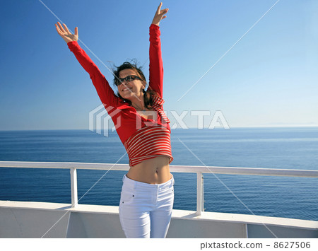 Happy lady on liner on seascape background Happy lady on liner on seascape background 8627506