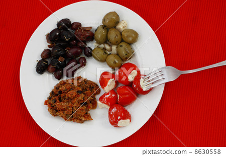 olives, pepper on the plate 8630558