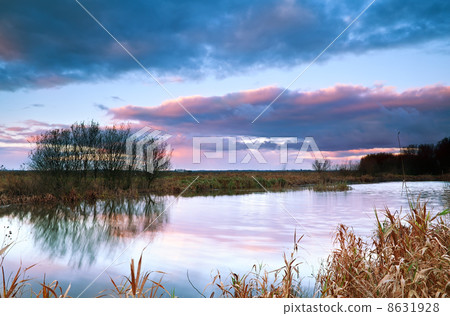 dramatic sky at sunrise bu pond 8631928