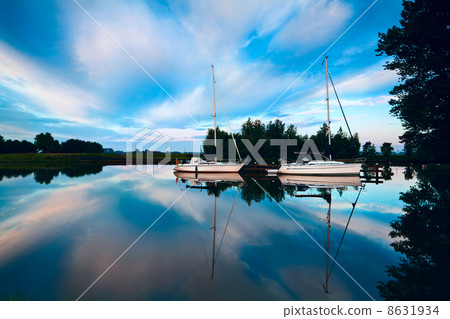 two yachts on river at sunrise 8631934
