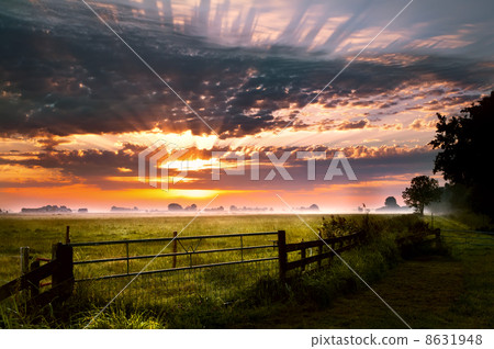 colorful sunrise in rural Groningen 8631948
