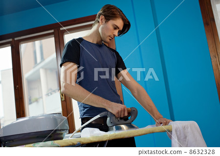 man with iron doing chores 8632328