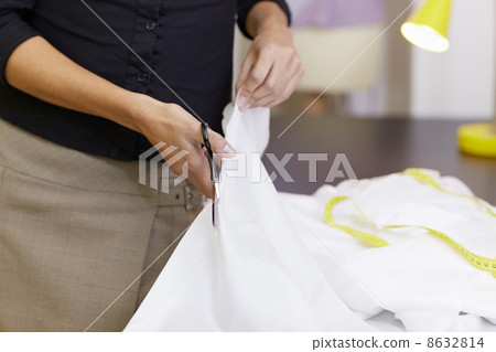Woman working in fashion design studio 8632814