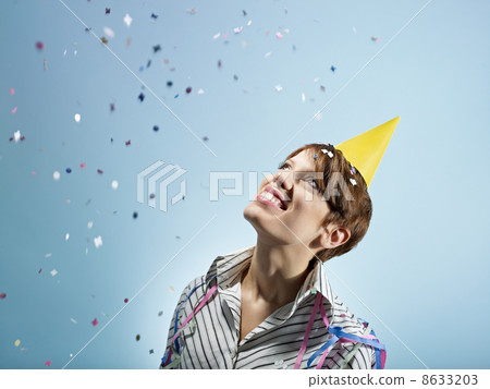 businesswoman with confetti businesswoman with confetti 8633203